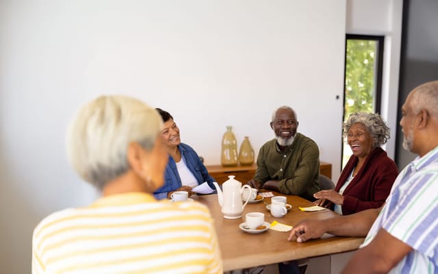 Residents enjoying a lively activity in a common area