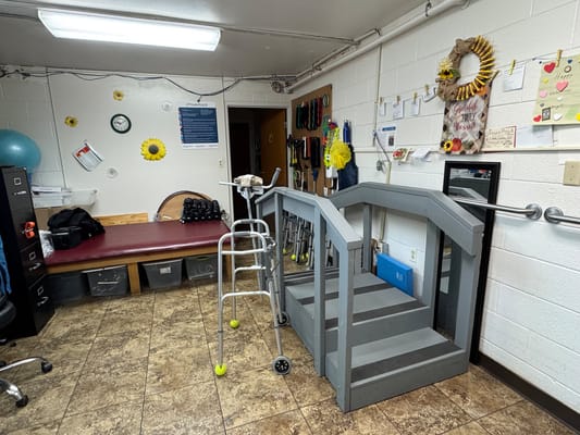 Interior view of a therapy room with equipment