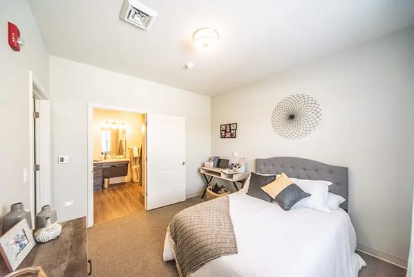 Bright resident room with modern furnishings