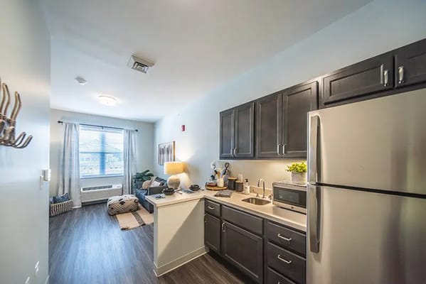 Modern kitchen area in a senior living unit