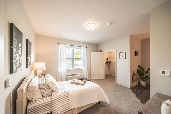 Cozy resident bedroom with natural light