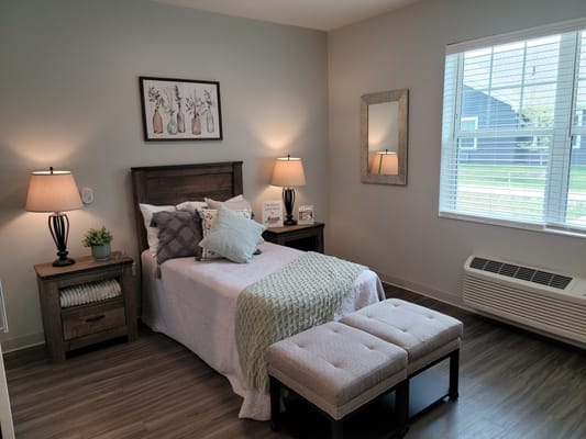 Cozy private resident room with decor and natural light