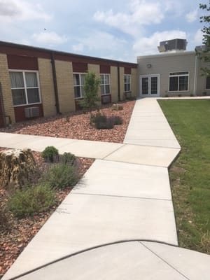 Pathway leading to the main entrance of the facility