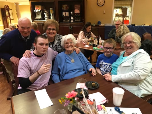 Residents and staff enjoying time together in a common area