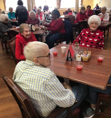 Residents enjoying activities in the common area