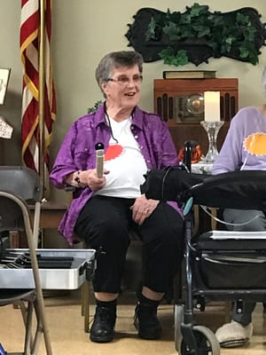 Resident participating in an activity session