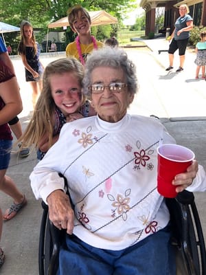 A resident enjoying a party with children