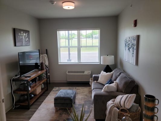 Cozy living room in a resident's room