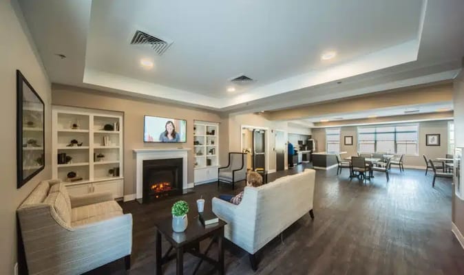 A cozy common area with residents lounging