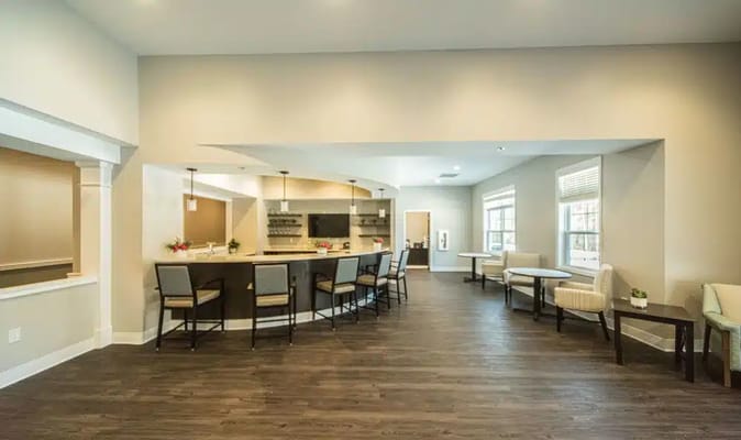 Interior view of a common area with seating and bar