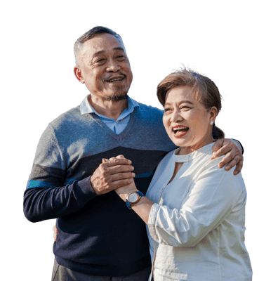 Happy elderly couple dancing outdoors