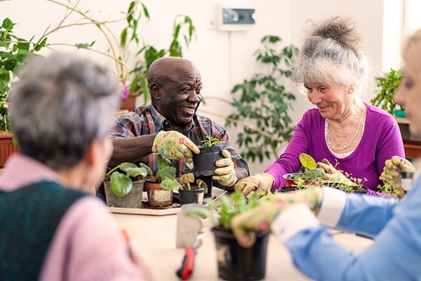 Residents engaging in a gardening activity together