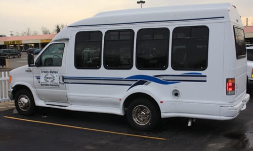 Facility transport van parked in a lot