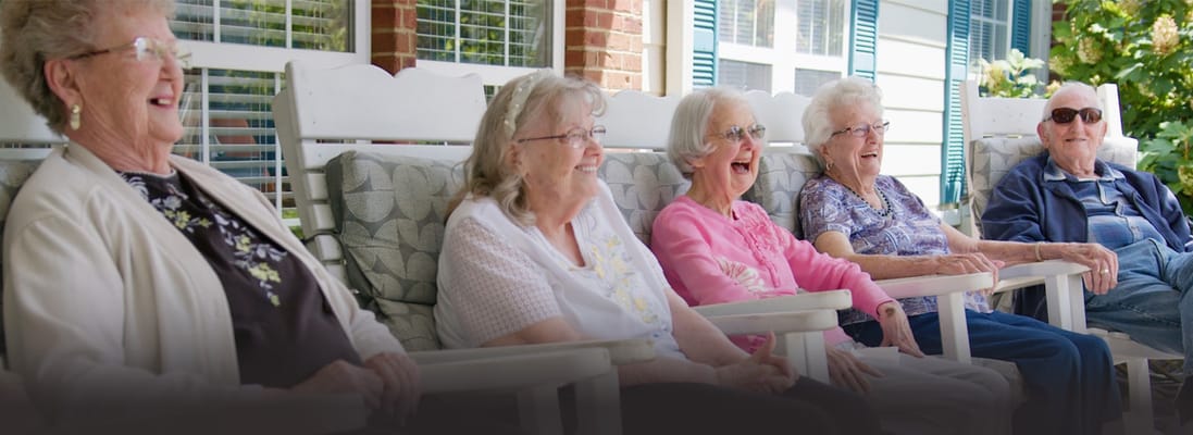 Residents enjoying the outdoor seating area