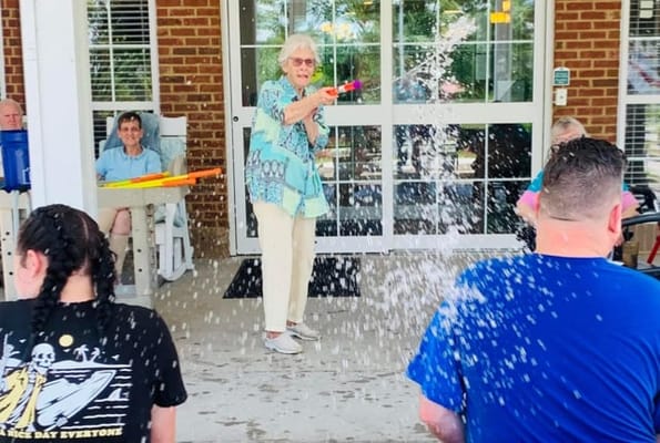 Residents enjoying a water activity on a sunny day
