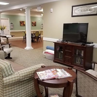 Common area with seating and a television
