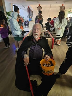 Resident in costume during a festive activity