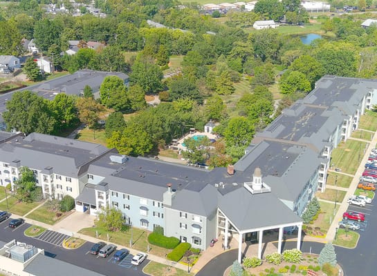 Aerial view of the Richmond Place Senior Living facility with gardens