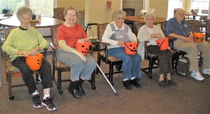 Residents participating in a Halloween-themed activity