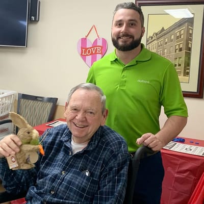 Staff member and resident enjoying a social activity