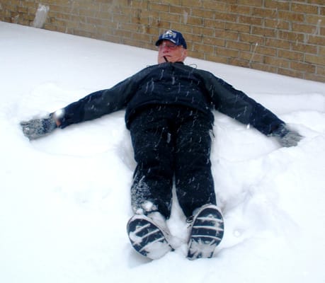 Resident enjoying snow outdoors at the facility