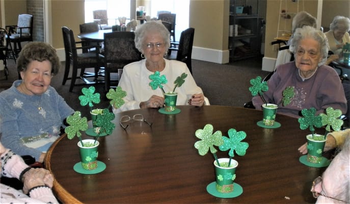 Residents celebrating with festive decorations at a table
