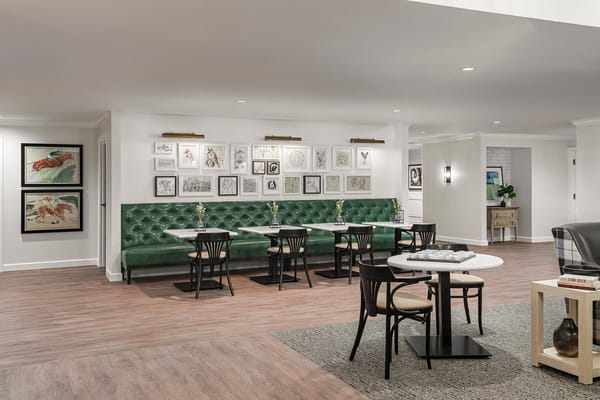 Bright common area with seating and artwork