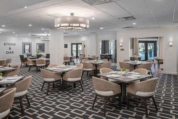 Modern dining room setup in a senior living facility