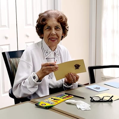 Resident engaged in arts and crafts activity