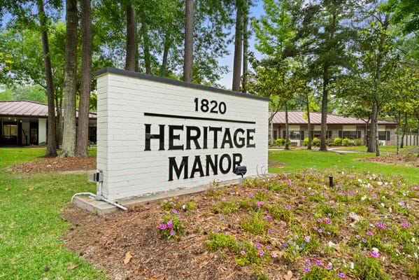 Exterior view of Heritage Manor sign and entrance