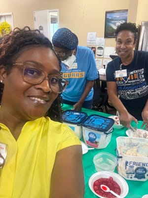 Staff and residents enjoying ice cream together