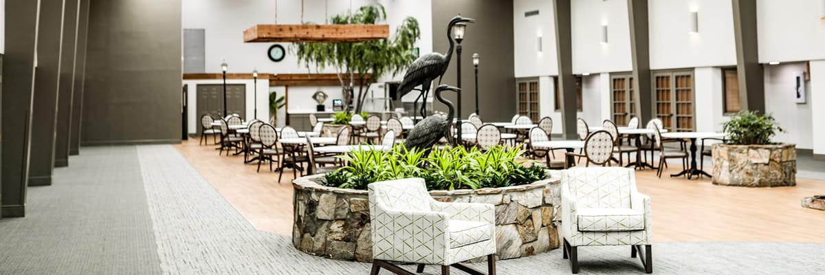 Interior view of a dining area with seating and decor