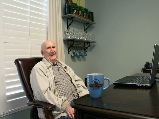 Resident enjoying a moment in a cozy room