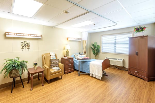 Cozy resident room with comfortable furniture and decor