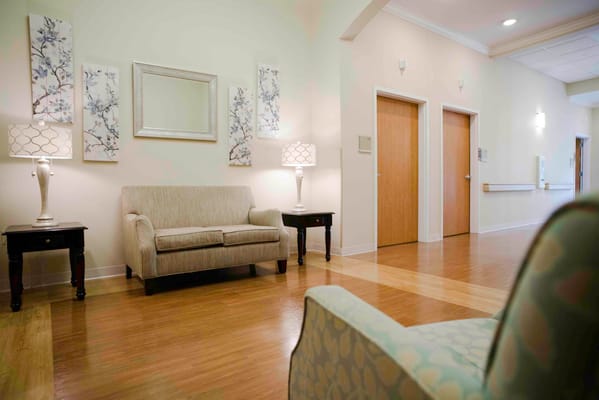 A cozy lounge area with seating and decor