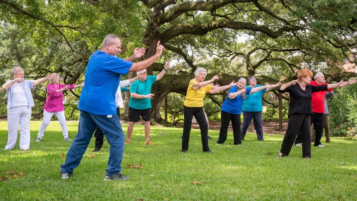 Residents participating in an outdoor group activity session