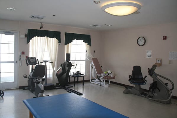 Interior view of a fitness area with exercise equipment