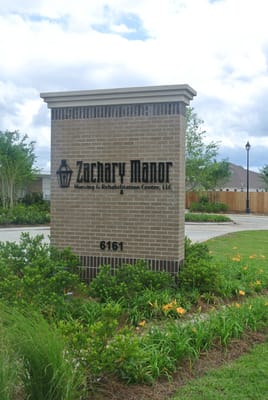 Exterior sign of Zachary Manor Nursing and Rehabilitation Center