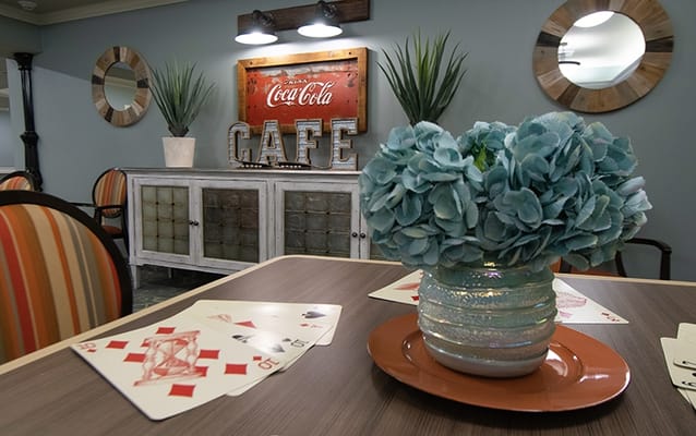 Cozy interior common area with card games and decor