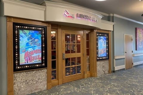 Entrance of the Liberators activity room with movie posters