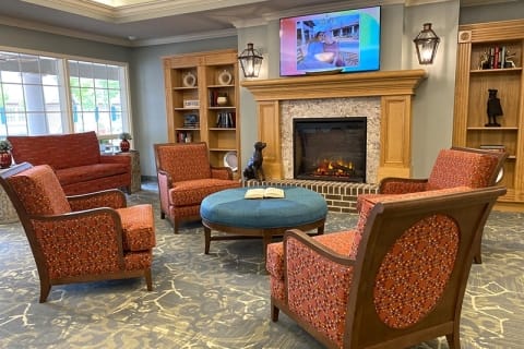 Comfortable seating in a welcoming common area with fireplace