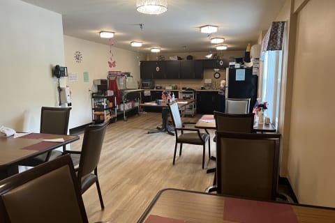 Interior view of a dining room in a senior living facility