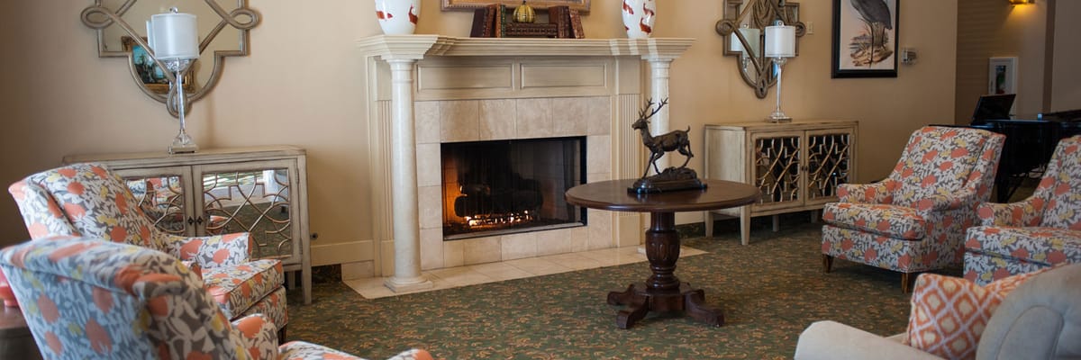 Cozy common area with a fireplace and comfortable seating