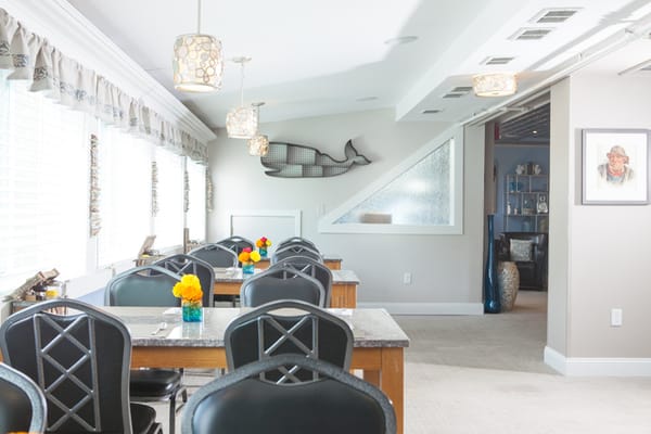 Bright dining area with tables and decorative elements