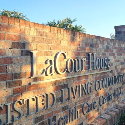 Exterior signage of LaCour House Assisted Living Community