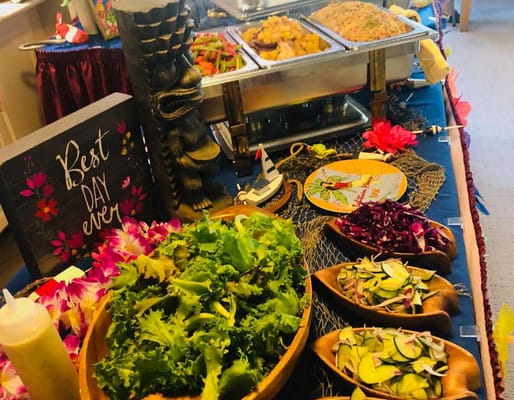 A vibrant meal presentation with salads and entrees
