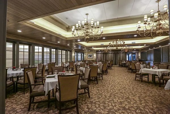 Elegant dining room with tables and chandeliers