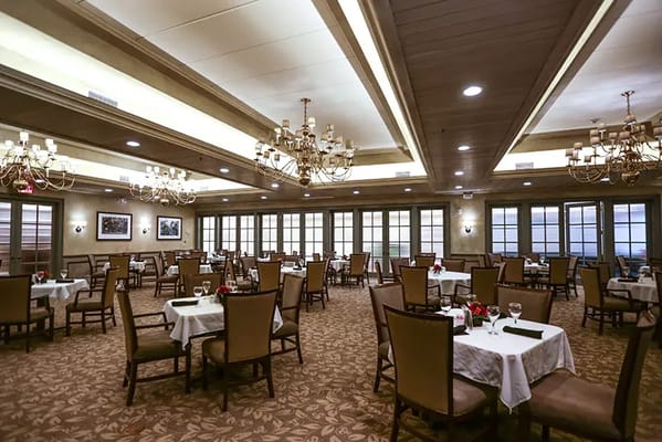 Dining area with tables set for a meal