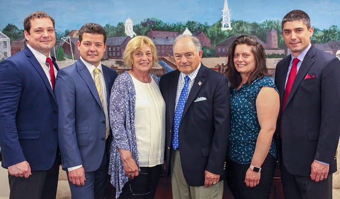 Staff and community members posing in a common area