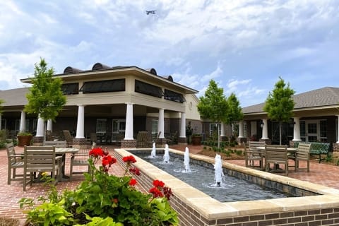 Outdoor courtyard with seating and fountains